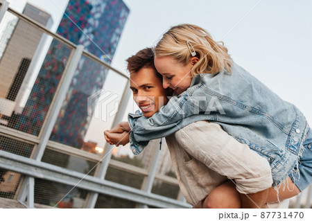 happy young couple having fun on roof top parking happy young couple having fun on roof top parking 87731470