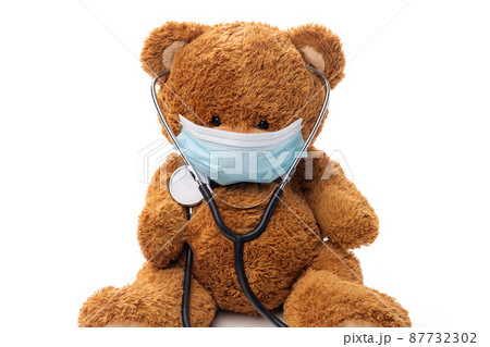 teddy bear toy in protective medical mask 87732302