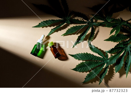 hemp essential oil and cannabis leaves hemp essential oil and cannabis leaves 87732323