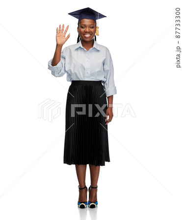 happy female graduate student waving hand 87733300