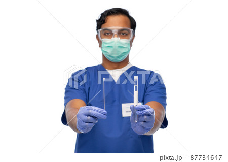 male doctor in mask with cotton swab and test tube male doctor in mask with cotton swab and test tube 87734647