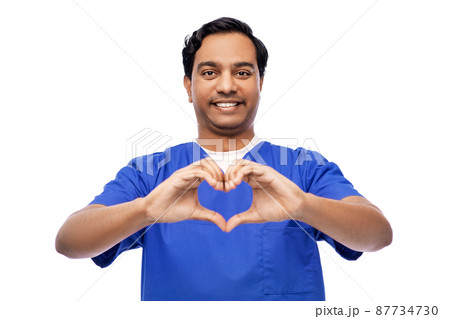 indian doctor or male nurse showing hand heart 87734730