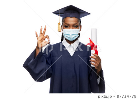 female graduate student in mask with diploma 87734779