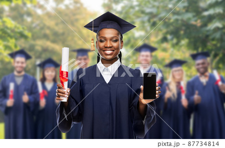 happy female graduate student with diploma 87734814