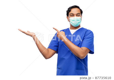 indian male doctor in blue uniform and mask indian male doctor in blue uniform and mask 87735610