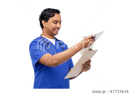 male doctor writing medical report on clipboard male doctor writing medical report on clipboard 87735626