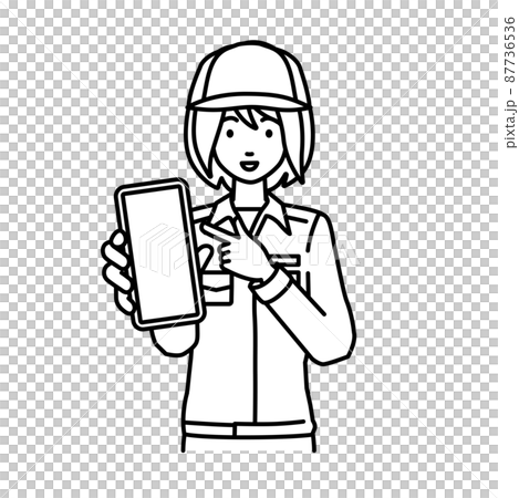 立ってスマートフォンを指差してこちらに向けて見せている作業員の女性 立ってスマートフォンを指差してこちらに向けて見せている作業員の女性 87736536
