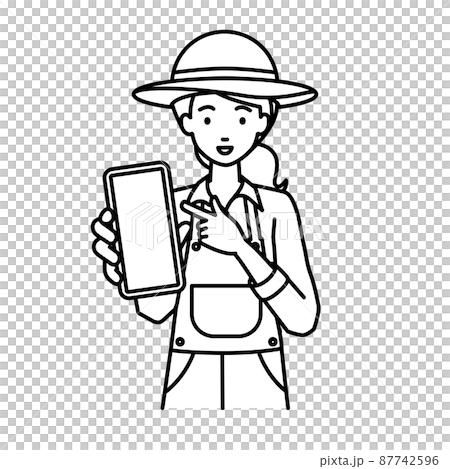 A farmer woman standing and pointing at her smartphone A farmer woman standing and pointing at her smartphone 87742596