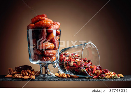 Dates and dried fruits, nuts and seeds. 87743052