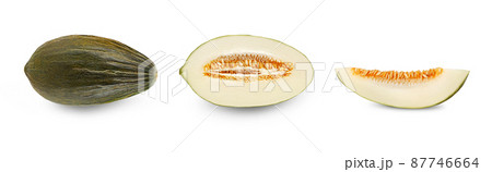 Delicious green tendral melon in cross-section, isolated on white background with copy space for text or images. Side view. Close-up shot. Delicious green tendral melon in cross-section, isolated on white background with copy space for text or images. Side view. Close-up shot. 87746664