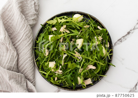 Salad with arugula, mozzarella and chicken breast Salad with arugula, mozzarella and chicken breast 87750625