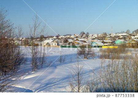 Winter landscape with village on background blue sky 87753338