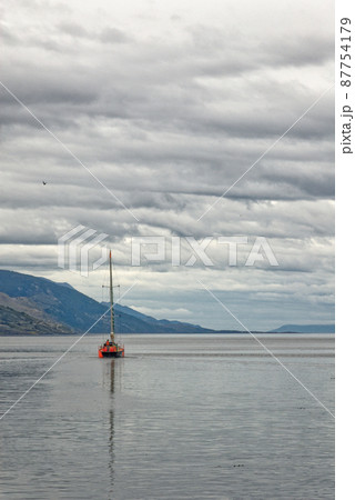 Small boat sailing in Beagle Channel - Tierra del Fuego - Argentina Small boat sailing in Beagle Channel - Tierra del Fuego - Argentina 87754179