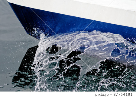 Boat Wave ocean trace on blue sea fresh water background Boat Wave ocean trace on blue sea fresh water background 87754191