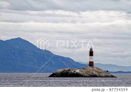 Les Eclaireurs Light House on rocky island on the Beagle Channel - Argentina Les Eclaireurs Light House on rocky island on the Beagle Channel - Argentina 87754354