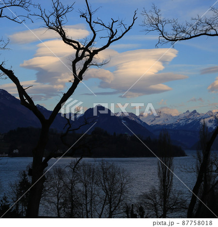 Round white clouds over Lake Lucerne. Round white clouds over Lake Lucerne. 87758018