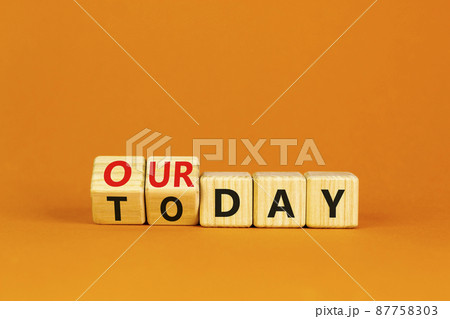 Today is our day symbol. Turned wooden cubes and changed concept words Today to our day. Beautiful orange table orange background, copy space. Business, motivation today is our day concept. 87758303