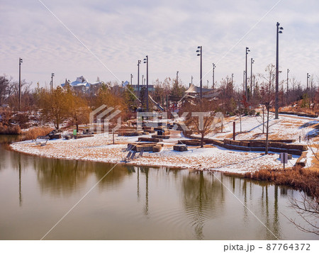 Beautiful snowy playground of the Gathering Place 87764372