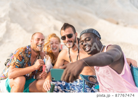 four friends having fun and posing for a selfie 87767474