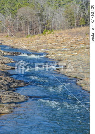 Mountain Fork River winding through Beavers Bend State Park in Broken Bow, Oklahoma Mountain Fork River winding through Beavers Bend State Park in Broken Bow, Oklahoma 87768909