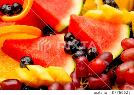 Fresh fruits concept, Healthy mix assorted fruits consist of tropical fruit and berry as background Fresh fruits concept, Healthy mix assorted fruits consist of tropical fruit and berry as background 87769625