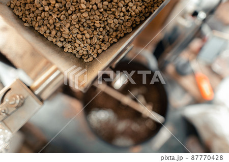 Roasted coffee beans in a cooling machine 87770428