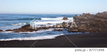 Huge waves crashing on the coast of Lanzarote 87771946