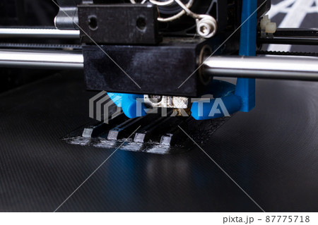 3d printer prints plastic part close up 3d printer prints plastic part close up 87775718