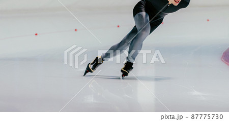 male athlete speed skater run ice skating track 87775730