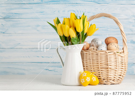 Easter greeting card with tulips and eggs 87775952