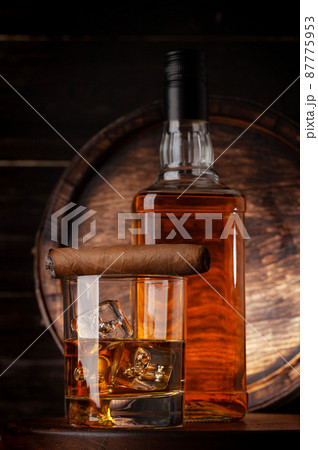 Glass and bottle with cognac Glass and bottle with cognac 87775953