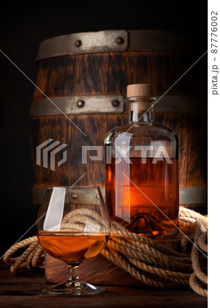 Glass and bottle with cognac Glass and bottle with cognac 87776002