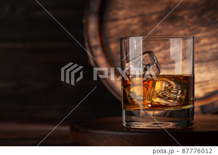 Glass with whiskey Glass with whiskey 87776012