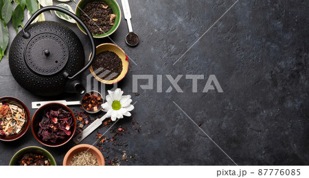 Various dried tea and teapot 87776085