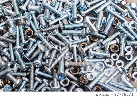 Metal bolts and nuts closeup, background or texture Metal bolts and nuts closeup, background or texture 87776671