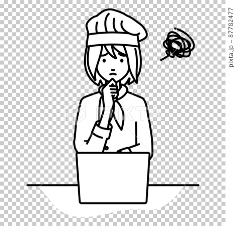 A cook woman sitting at a desk and opening her PC A cook woman sitting at a desk and opening her PC 87782477