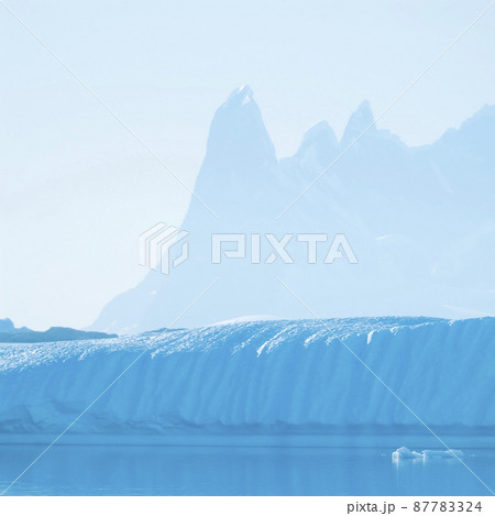 Lemaire strait coastal landscape, mountains and icebergs, Antarctic Peninsula, Antartica. Lemaire strait coastal landscape, mountains and icebergs, Antarctic Peninsula, Antartica. 87783324