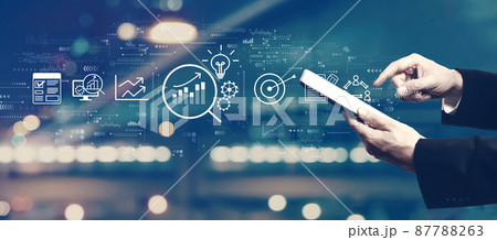 Data Analysis concept with businessman using a tablet 87788263