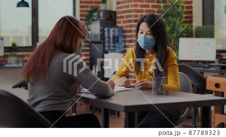 Business worker interviewing candidate at job application meeting Business worker interviewing candidate at job application meeting 87789323