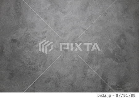 Designed dark stucco background. Plastered wall texture. Designed dark stucco background. Plastered wall texture. 87791789