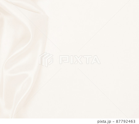 Smooth elegant golden silk or satin luxury cloth texture as wedding background. Luxurious background design. In Sepia toned. Retro style 87792463