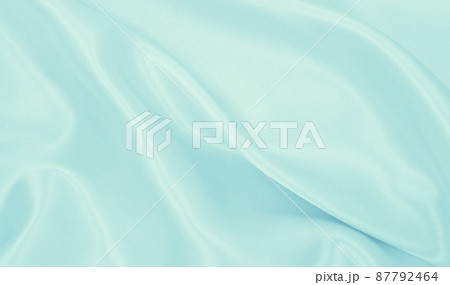 Smooth elegant blue silk or satin luxury cloth texture as abstract background. Luxurious background design 87792464