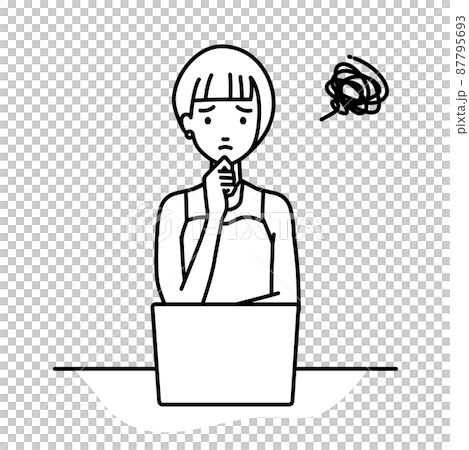 A woman in a dress sitting at a desk and opening her PC A woman in a dress sitting at a desk and opening her PC 87795693
