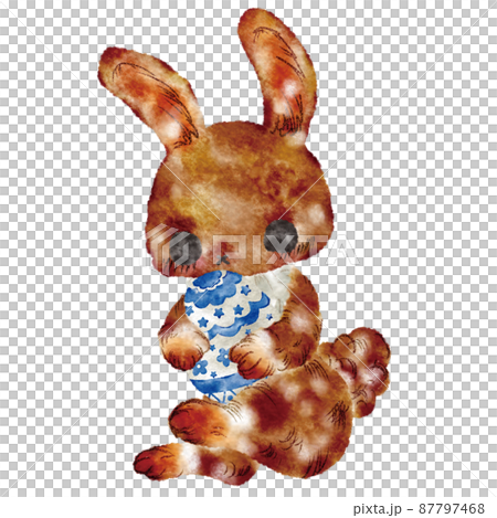 Rabbit holding an egg Rabbit holding an egg 87797468