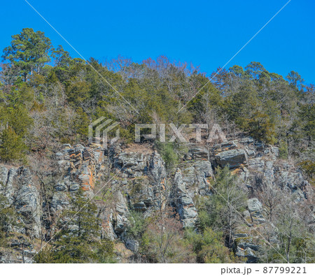 Beautiful Rock Wall in Beavers Bend State Park along the edge of the forest, Broken Bow, Oklahoma 87799221