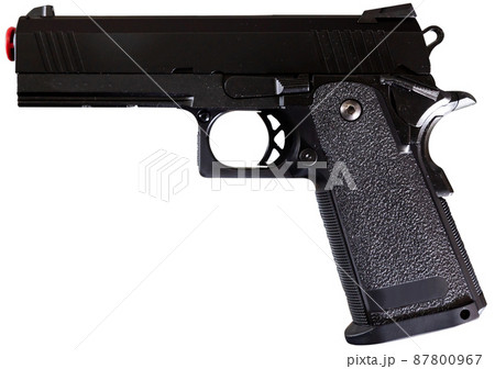 Black pistol isolated on white background 87800967