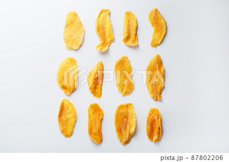 Dried fruit slices from organic ripe mango Dried fruit slices from organic ripe mango 87802206