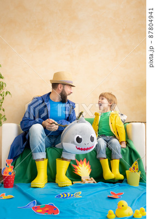 Dad and son enjoy a fishing trip 87804941