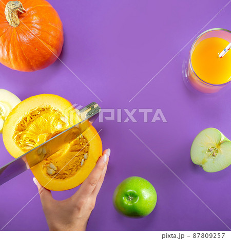 Fruit pumpkin apple carrot ginger on colored background 87809257