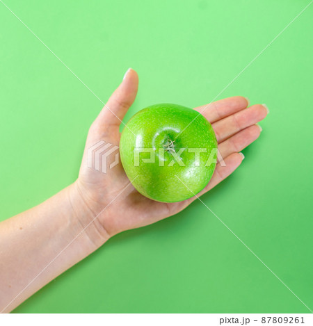 Fruit pumpkin apple carrot ginger on colored background Fruit pumpkin apple carrot ginger on colored background 87809261